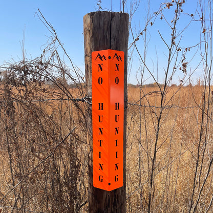 Rock River Outdoors "No Hunting" Sign on a fence post